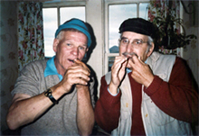 Photograph of Duncan Williamson with a friend